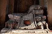 Ayutthaya, Thailand. Wat Chaiwatthanaram, the remains of Buddga statue inside the corner chedi of the gallery. 